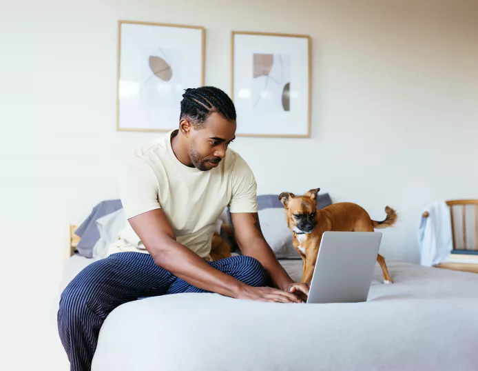 Man using pet telehealth care through video and chat